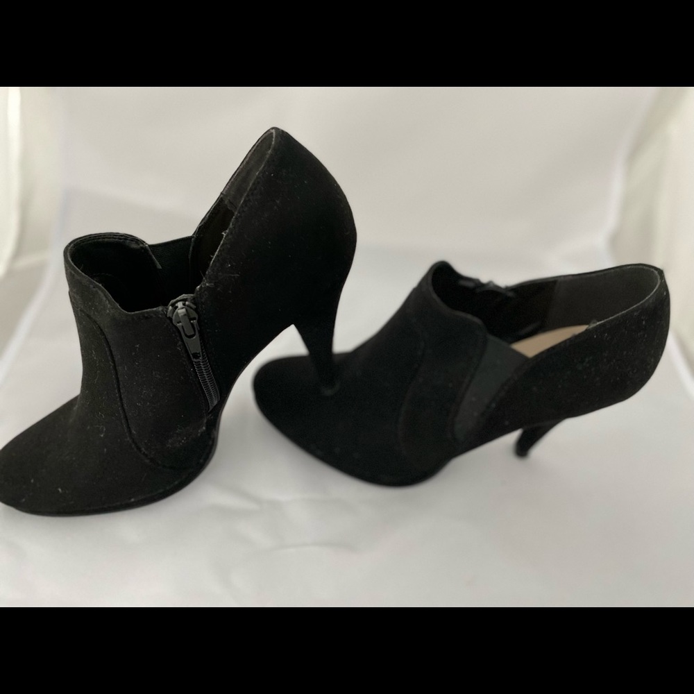 Casual black booties with heel height of 4” sz 8